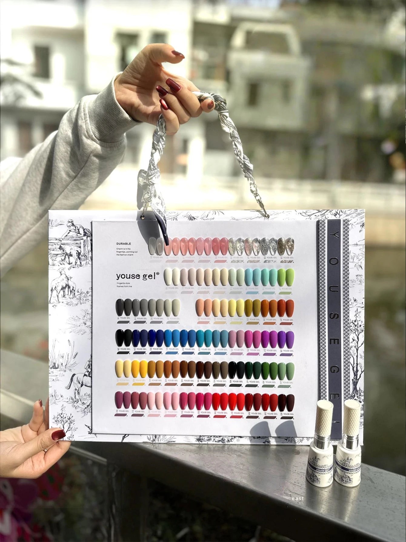 Nail salon gel polish kit, 60 colors of gel polish, 3 nail files, nail cutter oil, and a color chart for display.