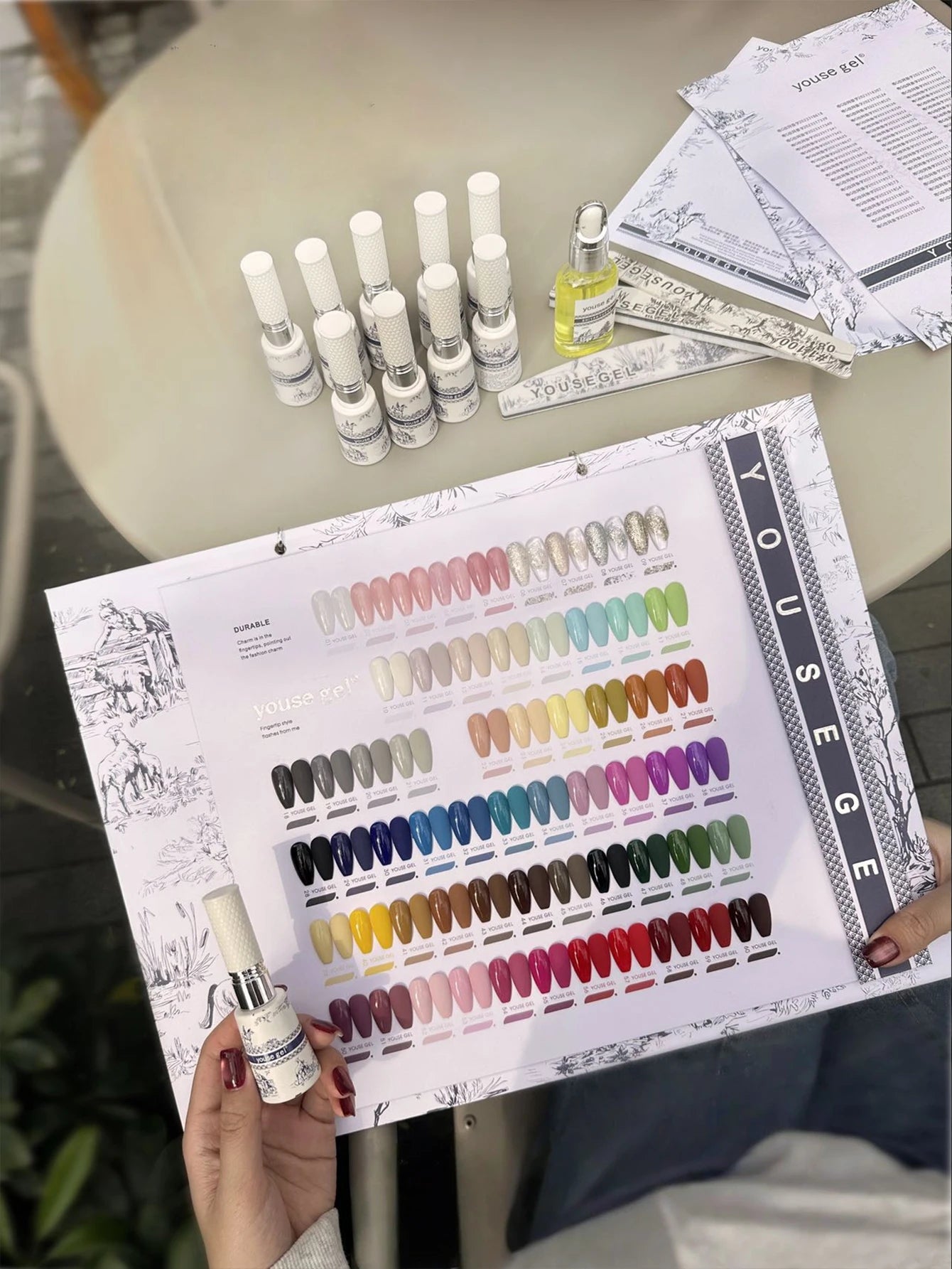 Nail salon gel polish kit, 60 colors of gel polish, 3 nail files, nail cutter oil, and a color chart for display.